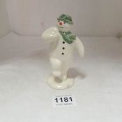 A Royal Doulton snowman figure