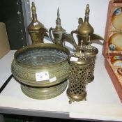 A quantity of Islamic brassware including bowl