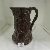 A Minton brown glazed jug