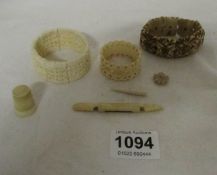 A quantity of bone and ivory items
