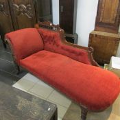 An Edwardian mahogany chaise longue