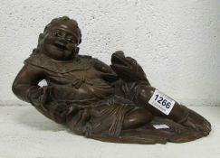 A carved Oriental figure