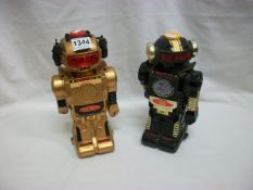 2 vintage robot's