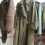A WW1 officer's trench coat with badges a/f