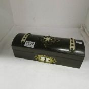 A brass mounted glove box