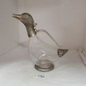 A silver plate and glass 'Duck' claret jug