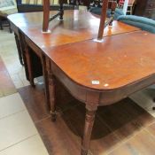 A mahogany 3 piece dining table comprising 2 D ends and drop leaf centre