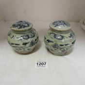 2 early blue glazed lidded jars