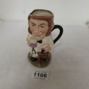 A Royal Doulton two faced jug 'Dr Jekyl and Mr Hyde'