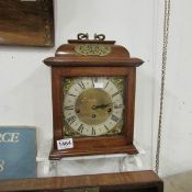 A mahogany bracket clock with brass mounts