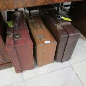 3 old suitcases