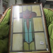 A framed stained glass panel, a/f
