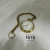 A gold plated Smith's pocket watch and an Albert chain (iwo)