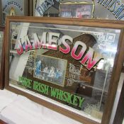A large Jameson's whisky advertising mirror