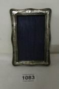 A hall marked silver photo frame, Birmingham 1942