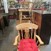 A pair of carver chairs