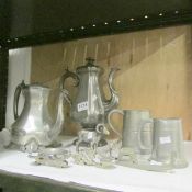 A mixed lot of pewter including tankards, coffee pot etc