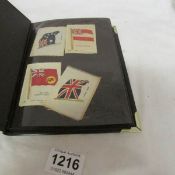 An album of silks including military regiments etc