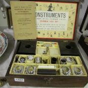 A cased Construments optical outfit, 100 set de luxe with instruction book