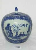 A large Oriental blue and white lidded jar