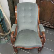 An early 19C mahogany framed armchair recentlyre-upholstered in teal