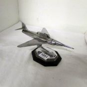 A chrome fighter jet lighter