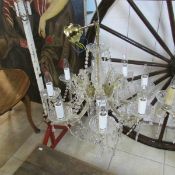 An 8 light glass chandelier