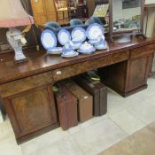 A Victorian mahogany double pedestal sideboard