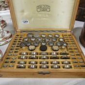 A Carl Zeiss distal spectacles trial case containing approximately 86 lenses