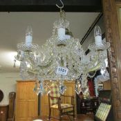 An 8 light glass chandelier