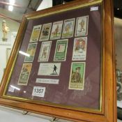 A framed set of 12 Will's cigarette cards of WW1 recruitment posters
A framed set of 12 Will's