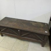 A carved oak blanket box, hinges a/f