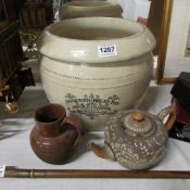 A Doulton Lambeth bread crock, a jug and a teapot, a/f