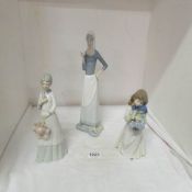 A NAO figurine and 2 Valencia figurines