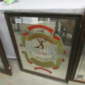 A Glenfiddich advertising mirror