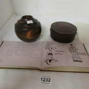 A bakelite box, heavy wood candleholder and autograph book