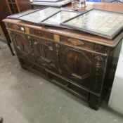 A large period carved oak coffer