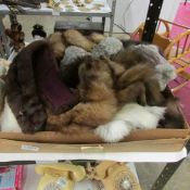 A box of fur stoles