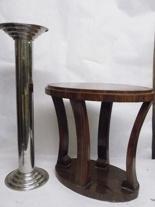 An Art Deco style table with oval top and base joined by slender legs - exotic wood veneer 60cm