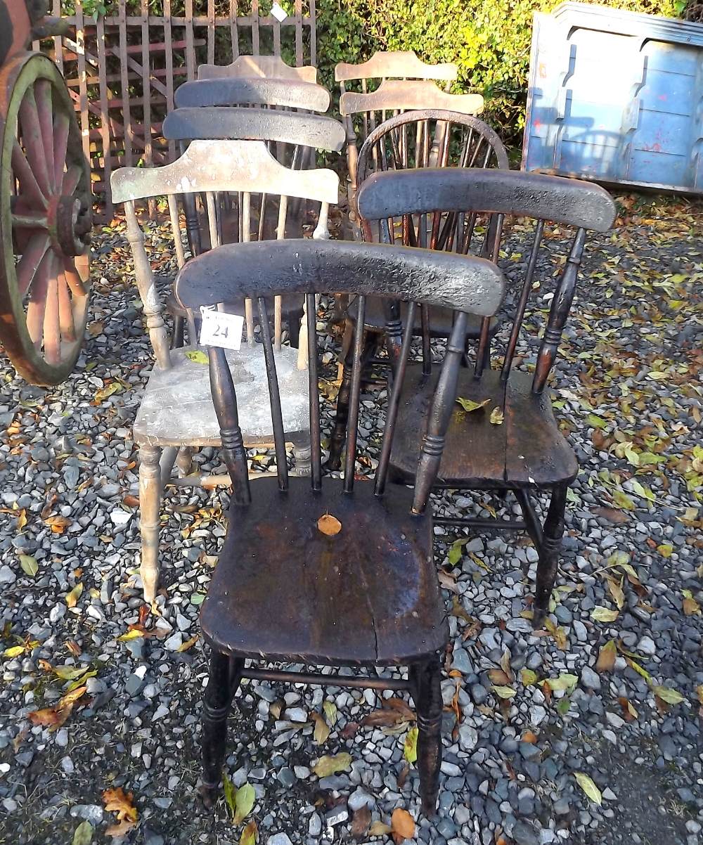 Collection of nine pine kitchen chairs.