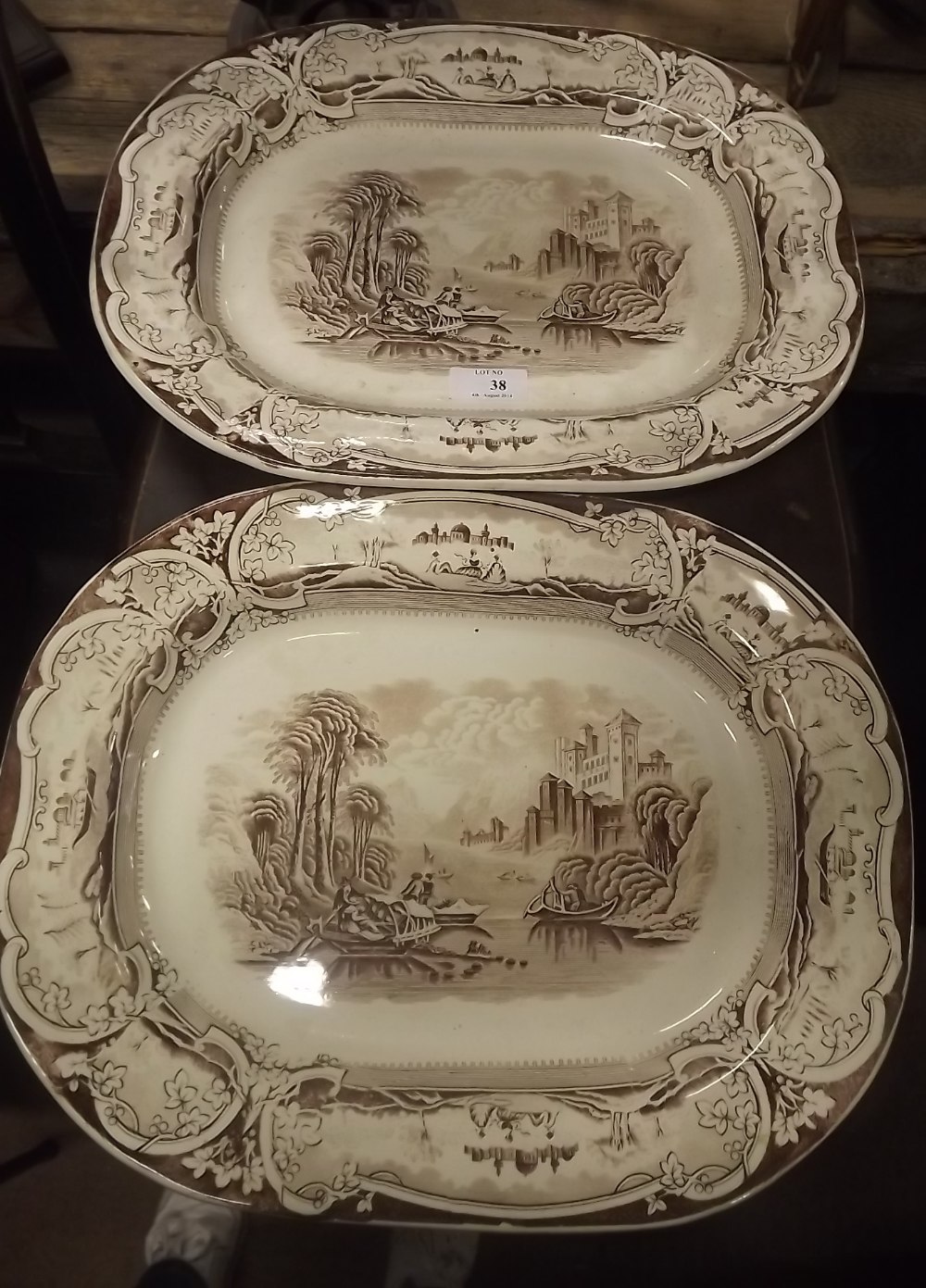 Pair of 19th. C. brown and white platters Damascus transfer pattern.