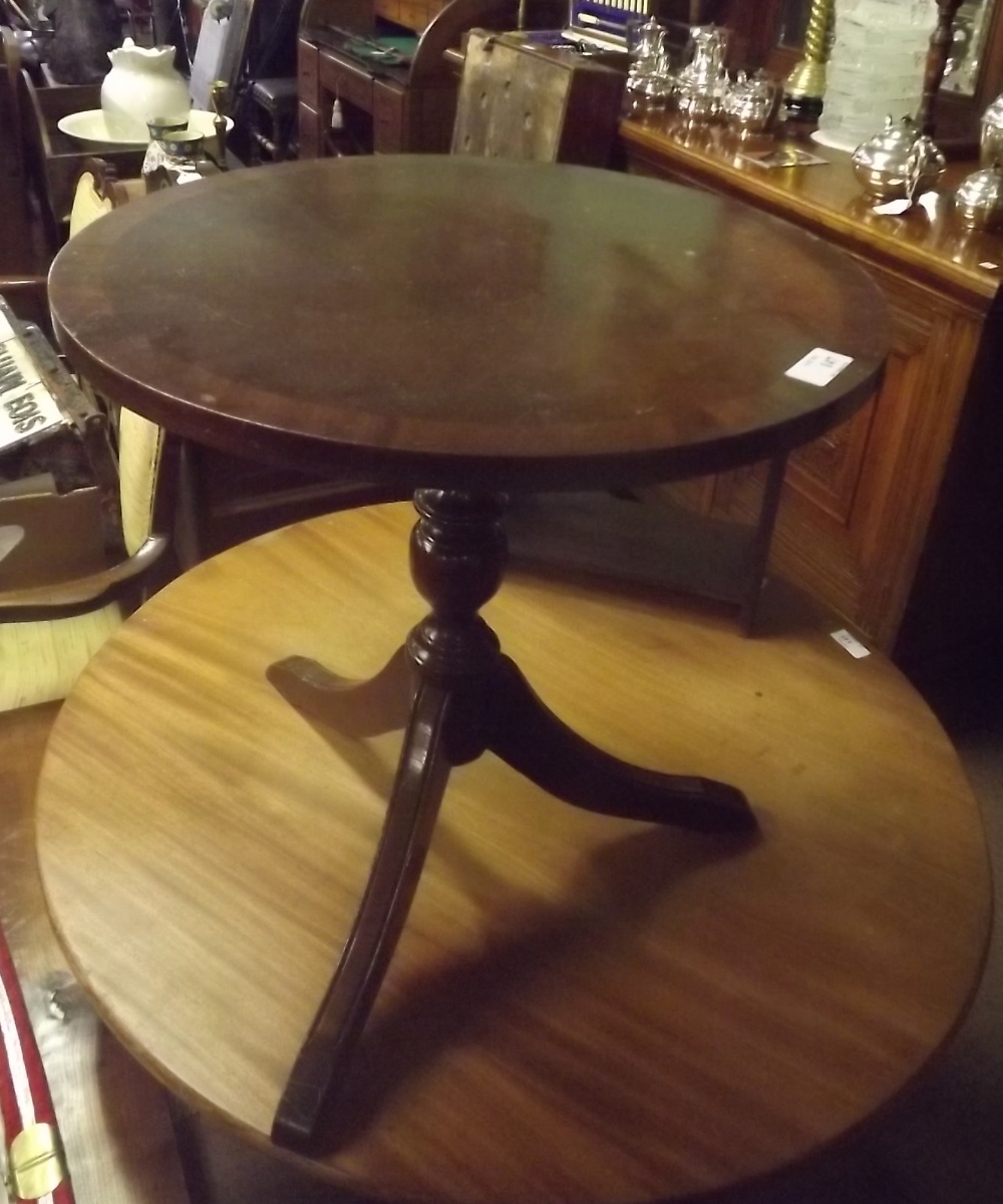 1970's mahogany wine table on turned column and three outswept feet