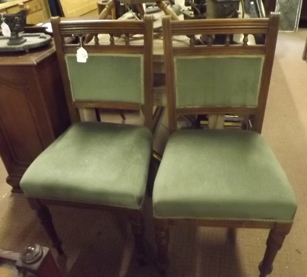 Pair of late Victorian mahogany upholstered chairs.