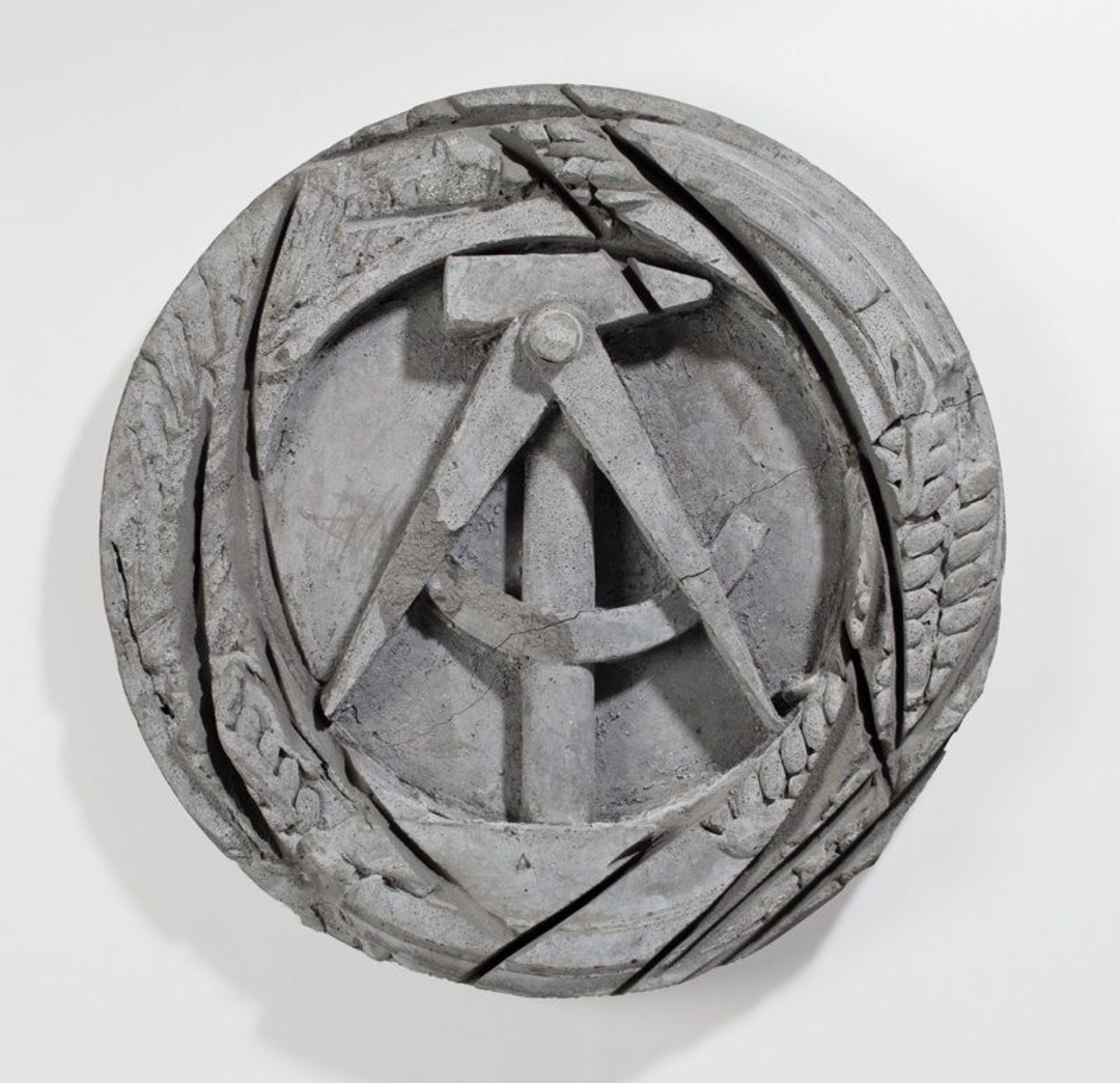 Olaf Metzel (Berlin 1952 – lives in Munich)  „RESTPOSTEN“. 1990  Concrete.  Diameter: 46 cm ( 18 ?