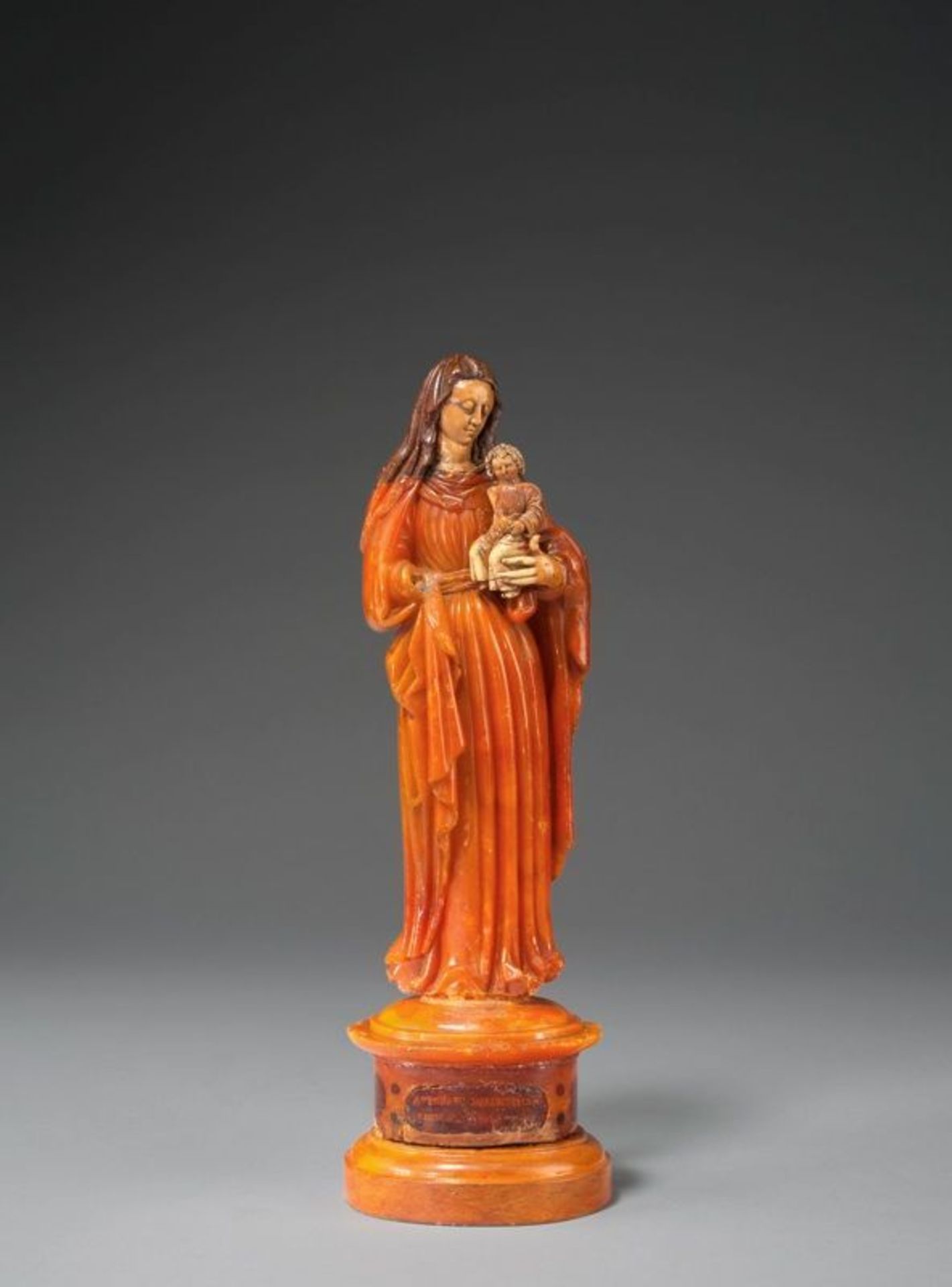 Southern Baltic Sea ()  MADONNA WITH CHILD. 1550-1600 / base circa 1570  Amber in three different