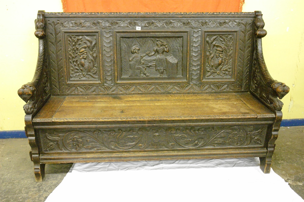 19TH CENTURY JACOBEAN REVIVAL CARVED ROMAYNE PANEL BOX SETTLE 157CM X 103CM