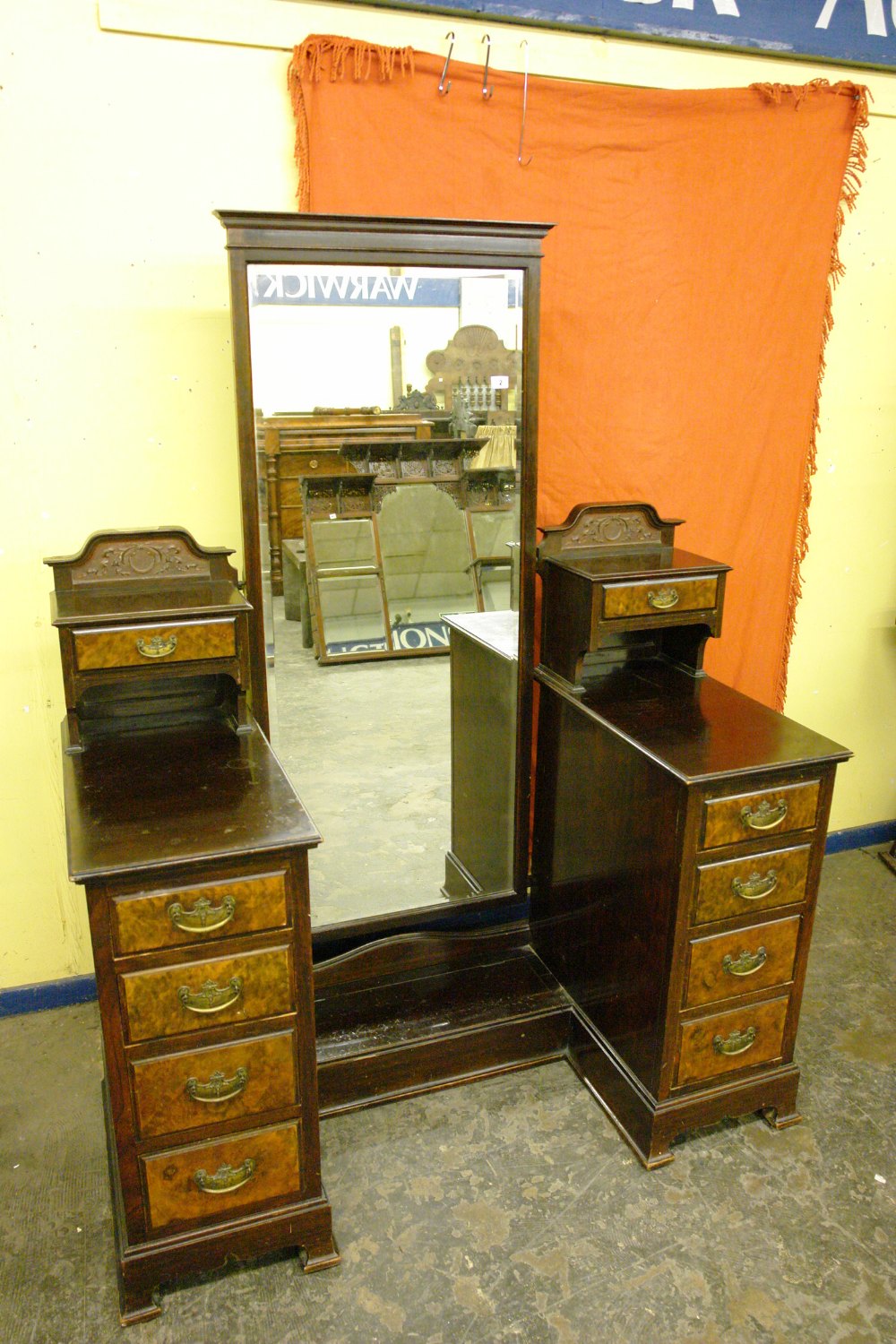 19TH CENTURY CARVED WALNUT DRESSING TABLE CONSISTING OF TEN DRAWERS WITH LARGE CENTRAL MIRROR