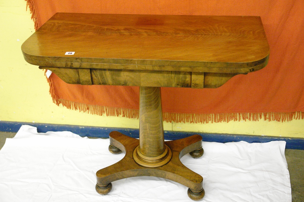 19TH CENTURY MAHOGANY FOLD OVER TEA TABLE ON TAPERED COLUMN UPON CONCAVE PLATFORM WITH TURNED BALL