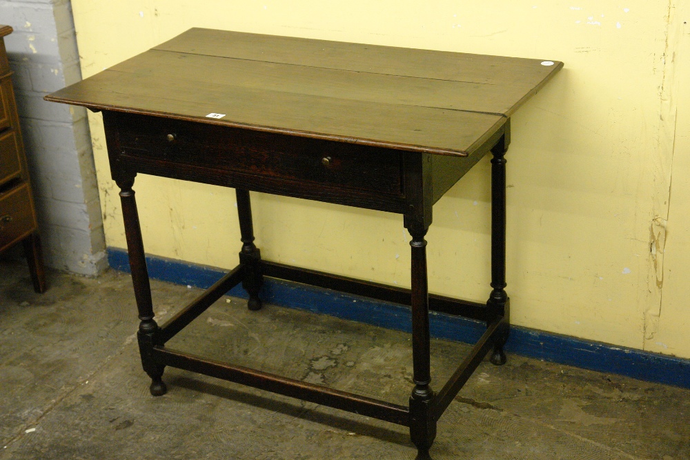 17THC OAK SIDE TABLE WITH OVER HANGING MOULDED TOP, SINGLE DRAWER ON BALUSTER STRETCHER LEGS 91CM