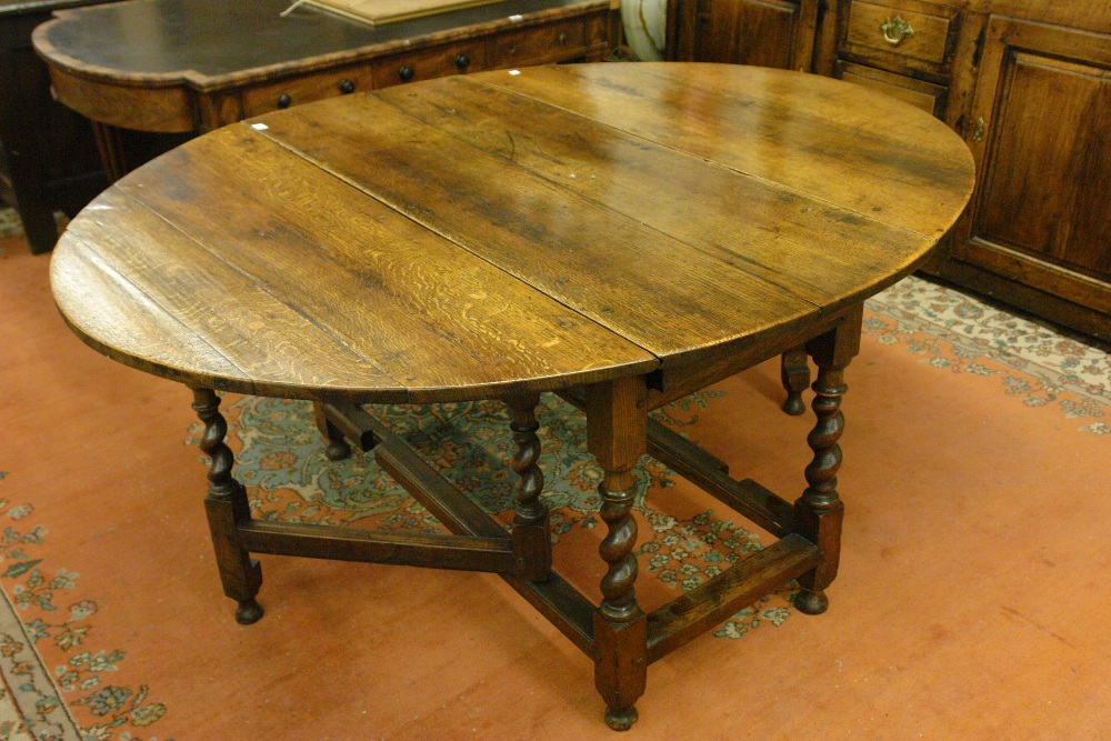 EARLY 18THC EIGHT SEATER OAK OVAL GATELEG TABLE WITH BARLEYSUGAR TWIST LEGS , FITTED WITH 2 DRAWERS.